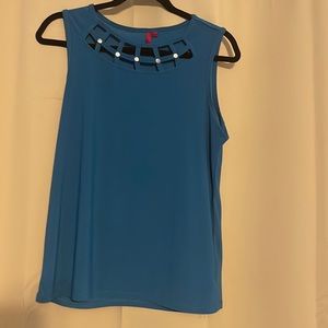 Cute turquoise top with interesting neckline